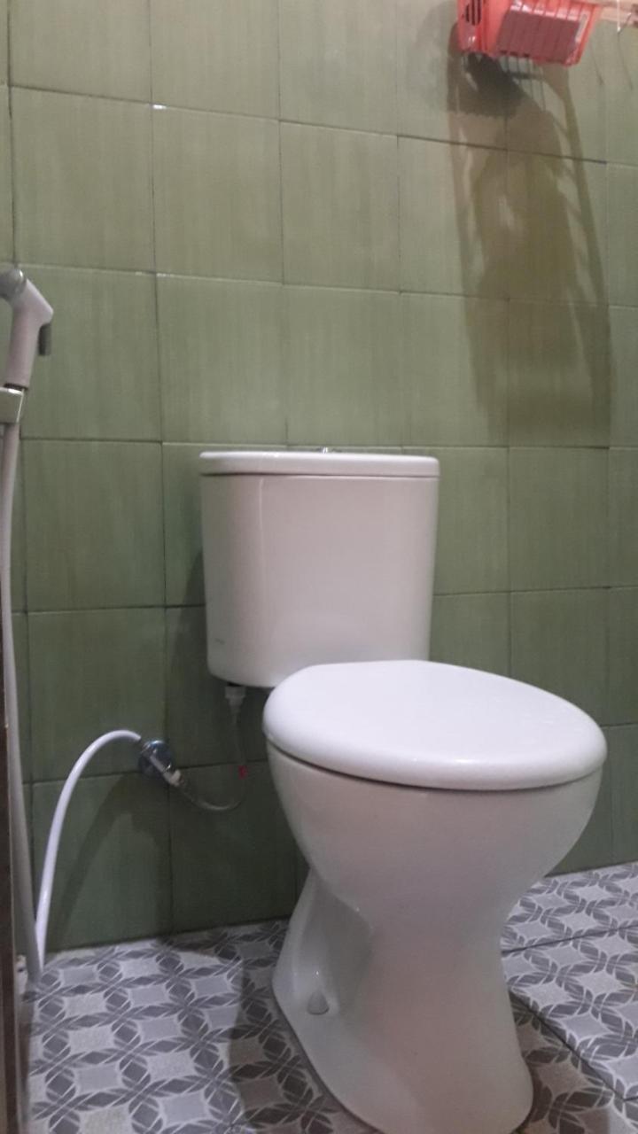 Penginapan Asidik Bira Exterior photo